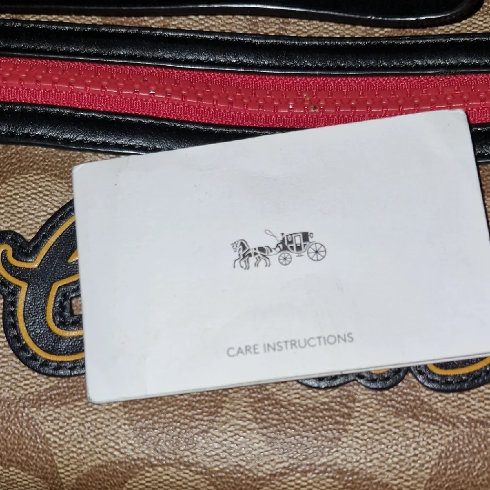 Coach Tan and Black Wristlet with Red Accent - Picture 5 of 6